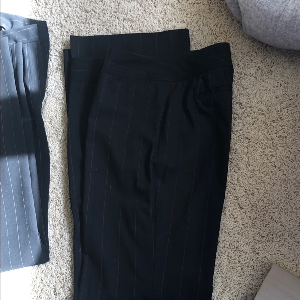 Blue trousers with red pin stripes